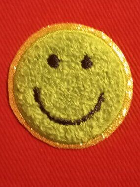 Green chenille smiley face iron on patch